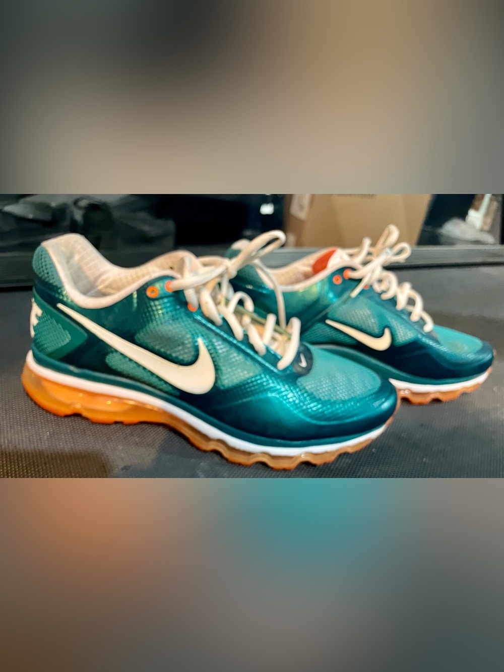 Metallic Green and Orange Nikes. Size 11.5 great condition.